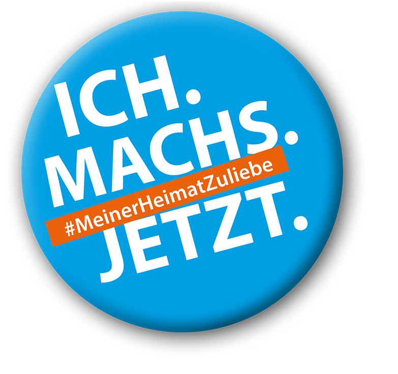 Blauer Badge mit Text: "Ich machs jetzt #MeinerHeimatZuliebe"